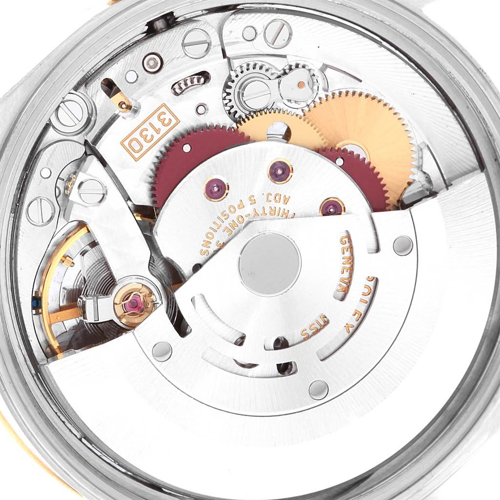 The image shows a close-up of the movement mechanism of a Rolex Oyster Perpetual 14233 Men's Steel and Gold (two tone) Champagne Dial 14233 Men's Steel and Gold (two tone) Champagne Dial watch.