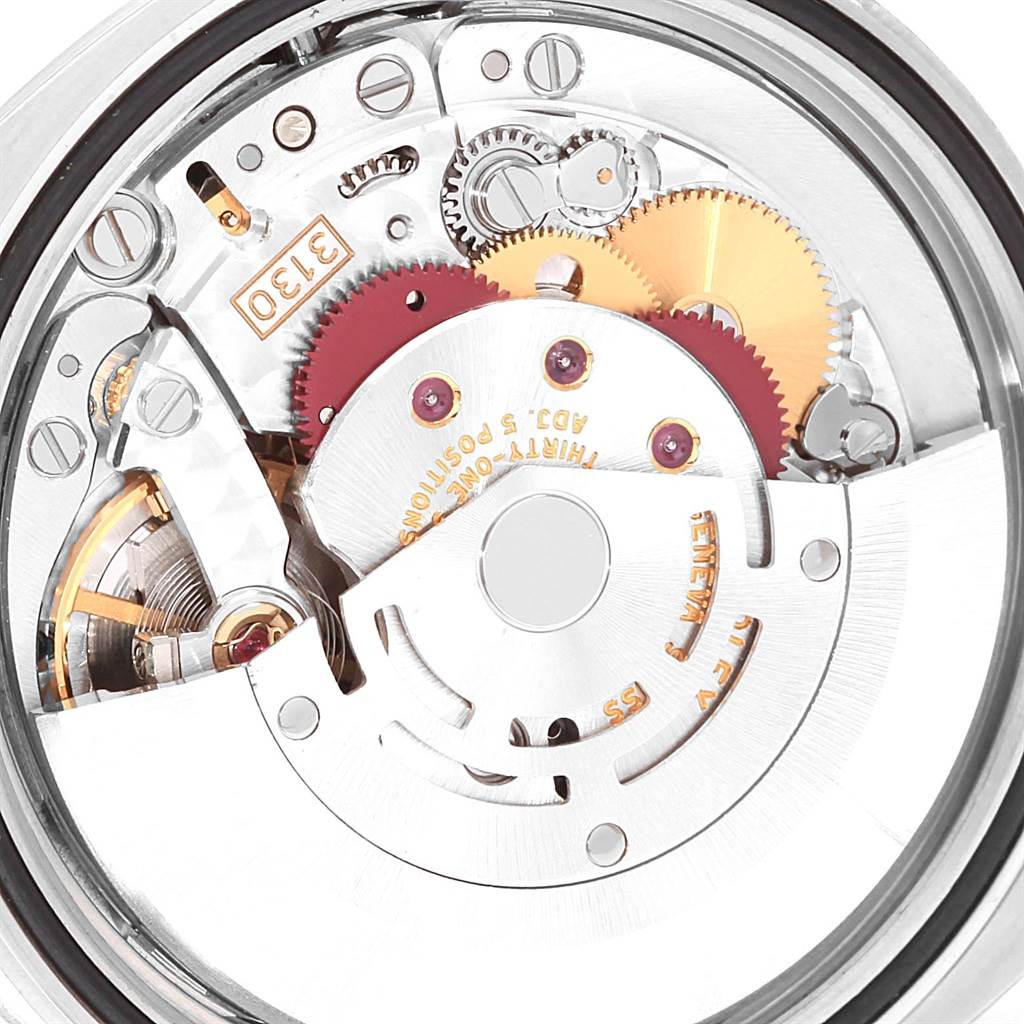 This image shows the internal movement mechanism of a Rolex Oyster Perpetual 116000 Men
s Stainless Steel Black Dial 116000 Men
s Stainless Steel Black Dial watch viewed from a top-down angle.