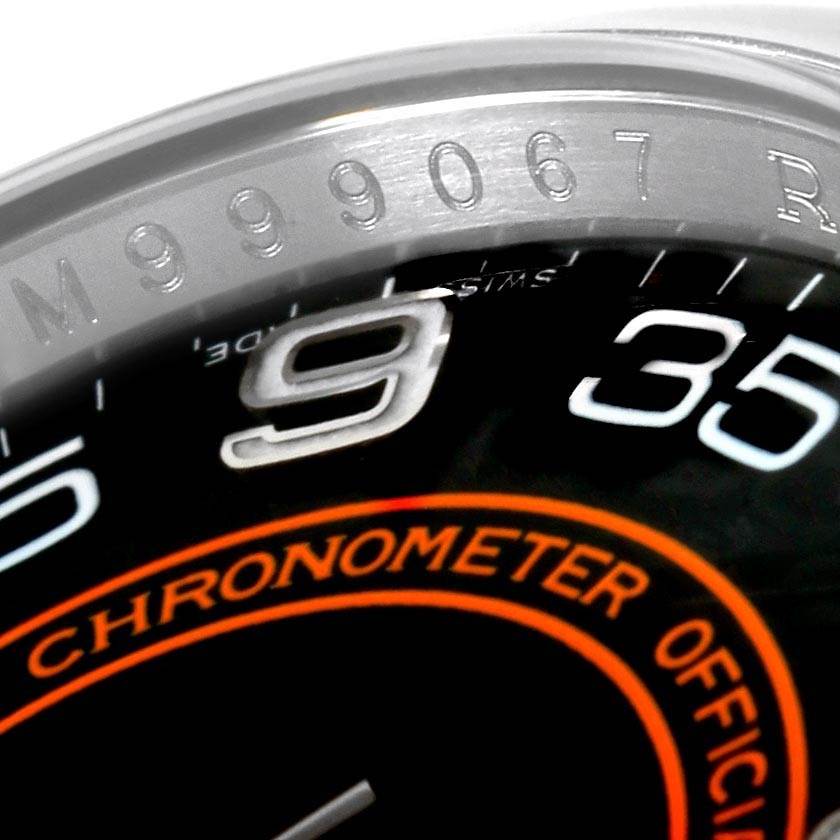 The close-up image shows the dial and casing of a Rolex Oyster Perpetual 116000 Men
s Stainless Steel Black Dial 116000 Men
s Stainless Steel Black Dial watch, highlighting the numbering and "Chronometer" text.
