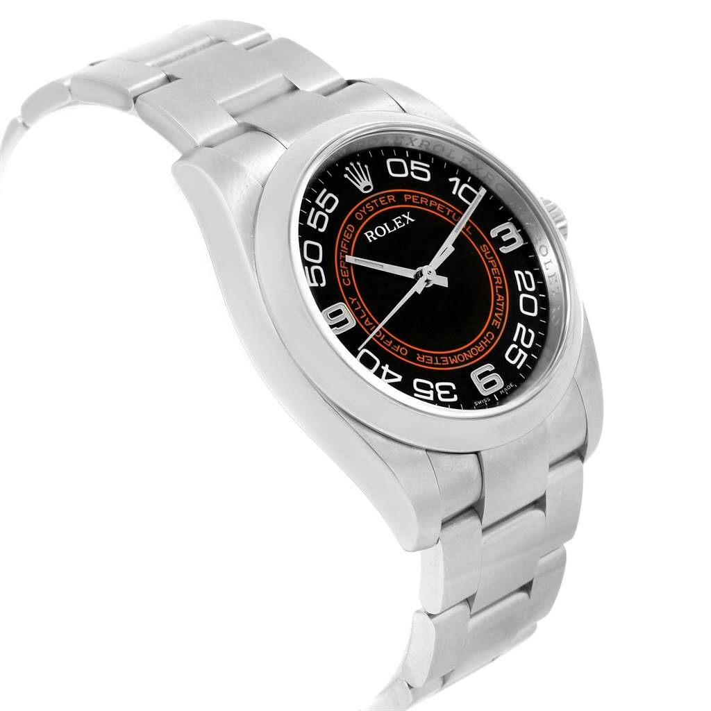 The image shows a Rolex Oyster Perpetual 116000 Men
s Stainless Steel Black Dial 116000 Men
s Stainless Steel Black Dial watch at a slight angle, displaying its face, bezel, and part of the bracelet.