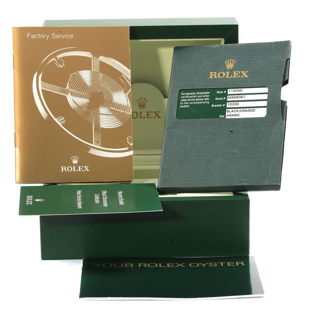 The image shows booklets, warranty, and packaging for the Rolex Oyster Perpetual 116000 Men
s Stainless Steel Black Dial 116000 Men
s Stainless Steel Black Dial watch, viewed from the front.