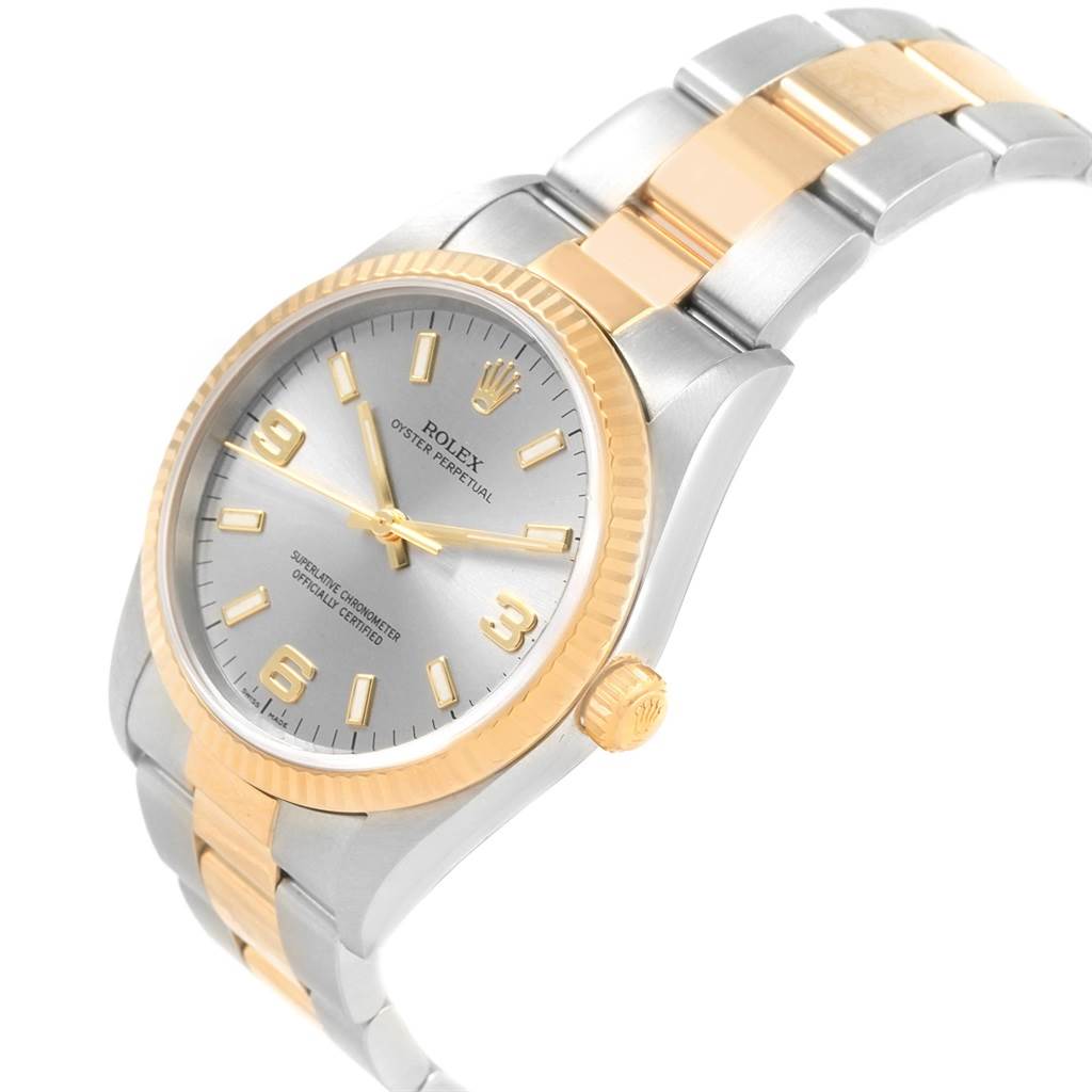 The image shows a Rolex Oyster Perpetual 14233 Men
s Steel and Gold (two tone) Grey Dial 14233 Men
s Steel and Gold (two tone) Grey Dial watch at a slight angle, highlighting the dial, bezel, and bracelet.