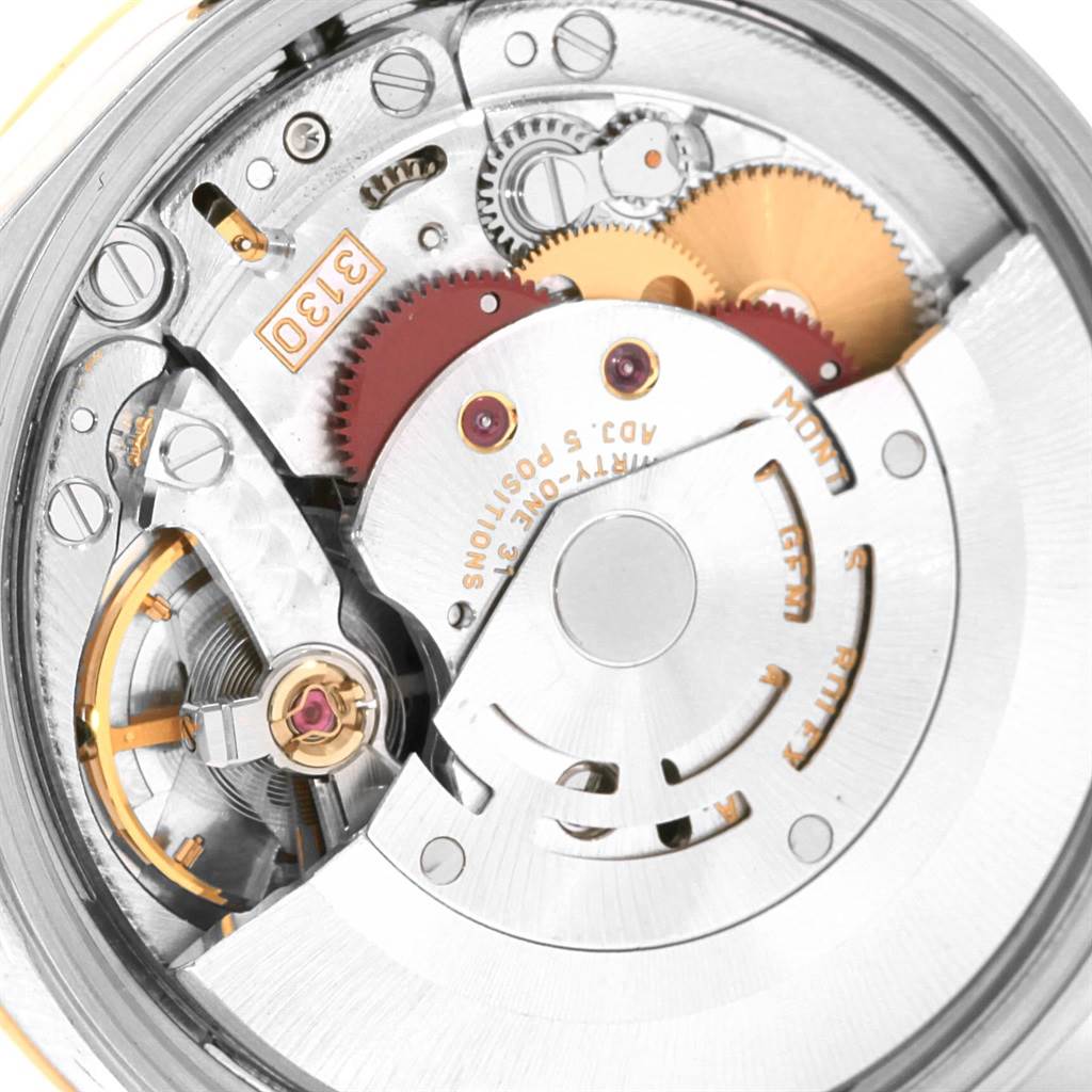 The image shows a close-up view of the internal mechanical movement of an Oyster Perpetual model by Rolex.
