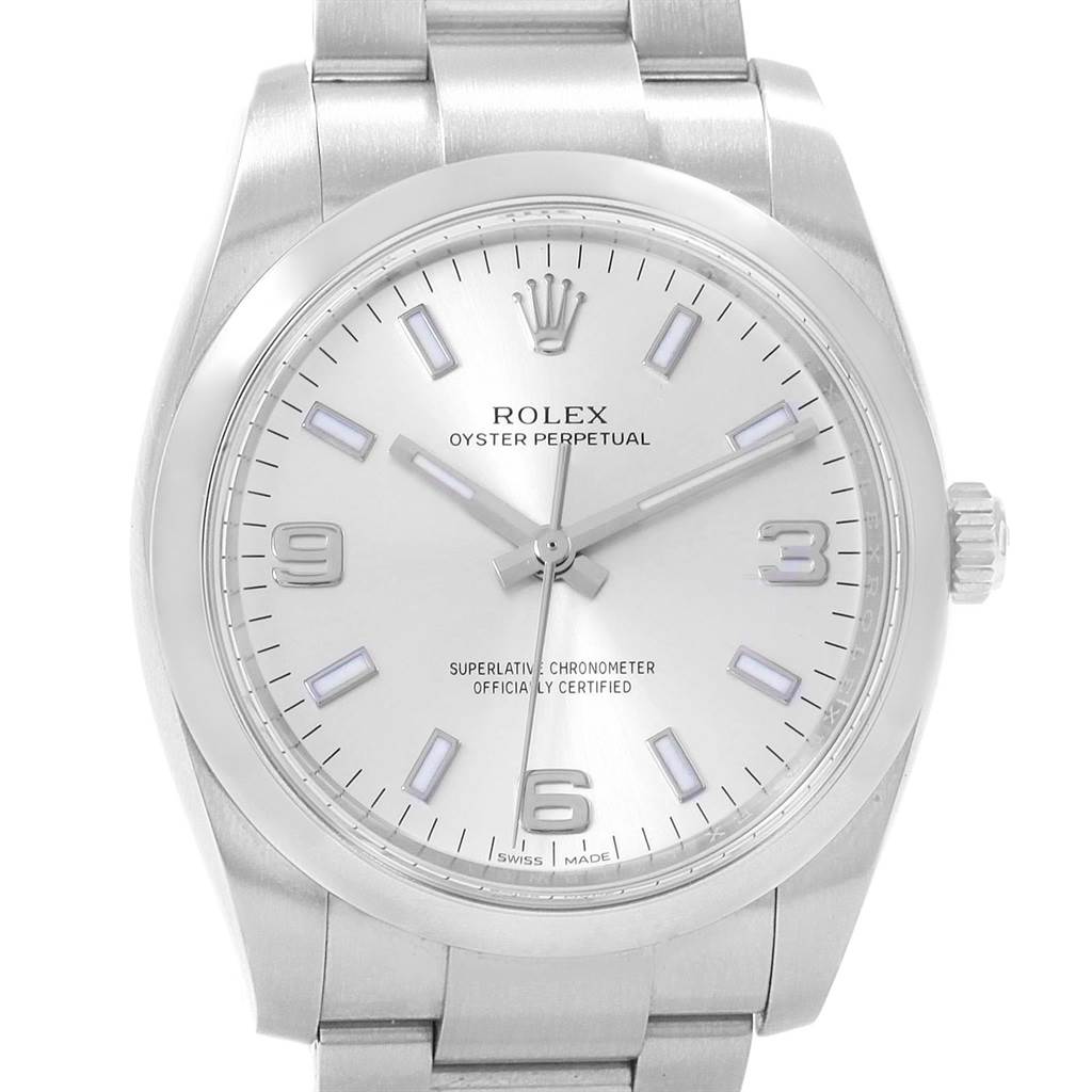 This image shows a frontal view of the Rolex Oyster Perpetual 114200 Men's Stainless Steel Silver Dial 114200 Men's Stainless Steel Silver Dial watch, featuring the dial, bezel, crown, and part of the bracelet.