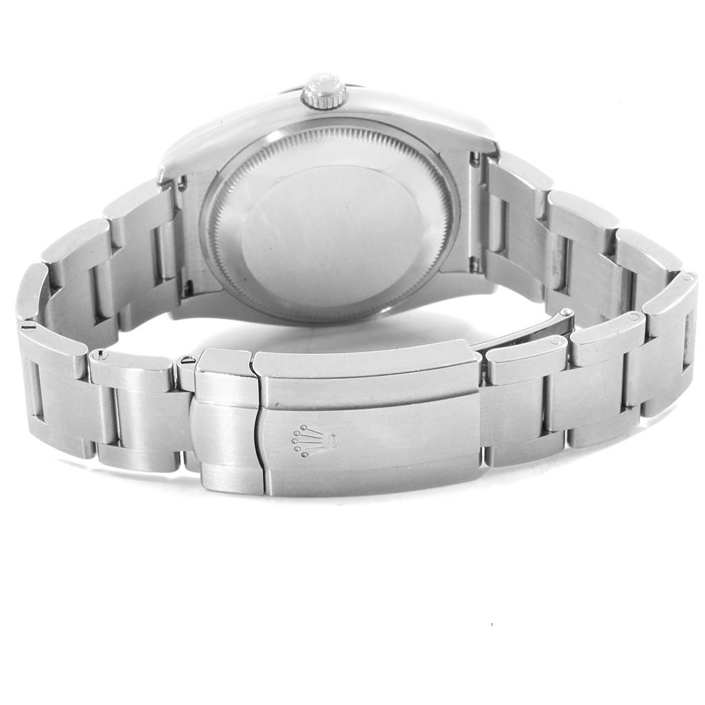 The image shows the back view and clasp of the Rolex Oyster Perpetual 114200 Men's Stainless Steel Silver Dial 114200 Men's Stainless Steel Silver Dial watch.