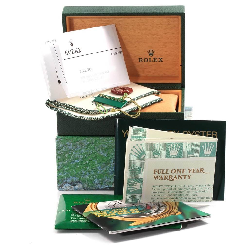 The image shows the packaging, warranty cards, and accessories of the Rolex Oyster Perpetual 14233 Men's Steel and Gold (two tone) Silver Dial 14233 Men's Steel and Gold (two tone) Silver Dial watch.