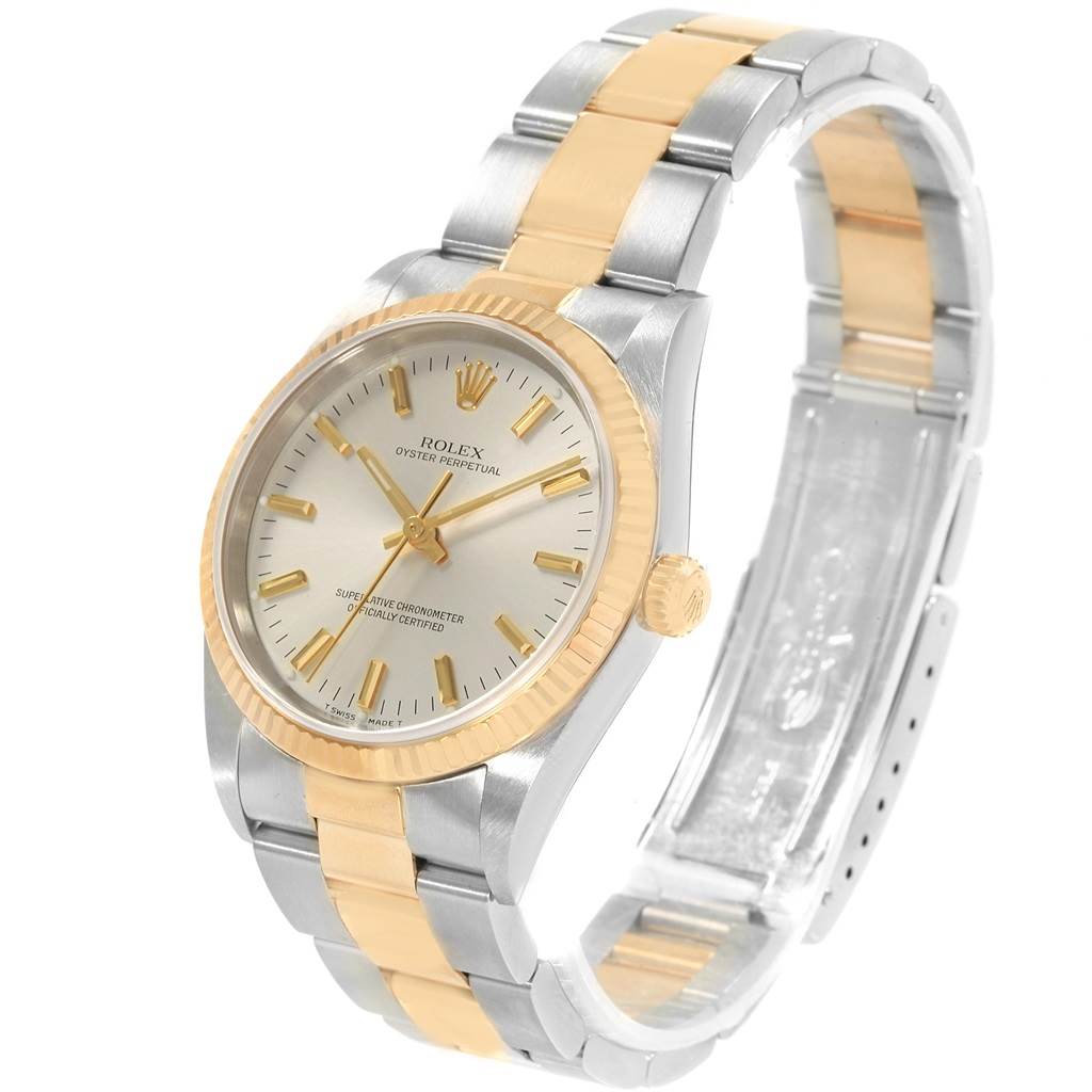 The image shows a Rolex Oyster Perpetual 14233 Men's Steel and Gold (two tone) Silver Dial 14233 Men's Steel and Gold (two tone) Silver Dial watch at a three-quarter angle, highlighting its dial, bezel, crown, and two-tone bracelet.