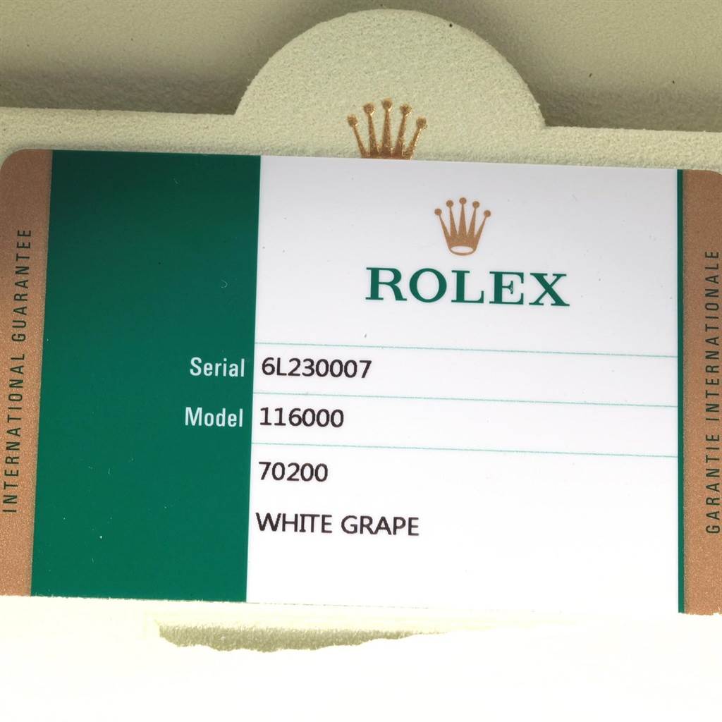 This image shows the guarantee card of a Rolex Oyster Perpetual 116000 Men's Stainless Steel Champagne Dial 116000 Men's Stainless Steel Champagne Dial model 116000 watch.