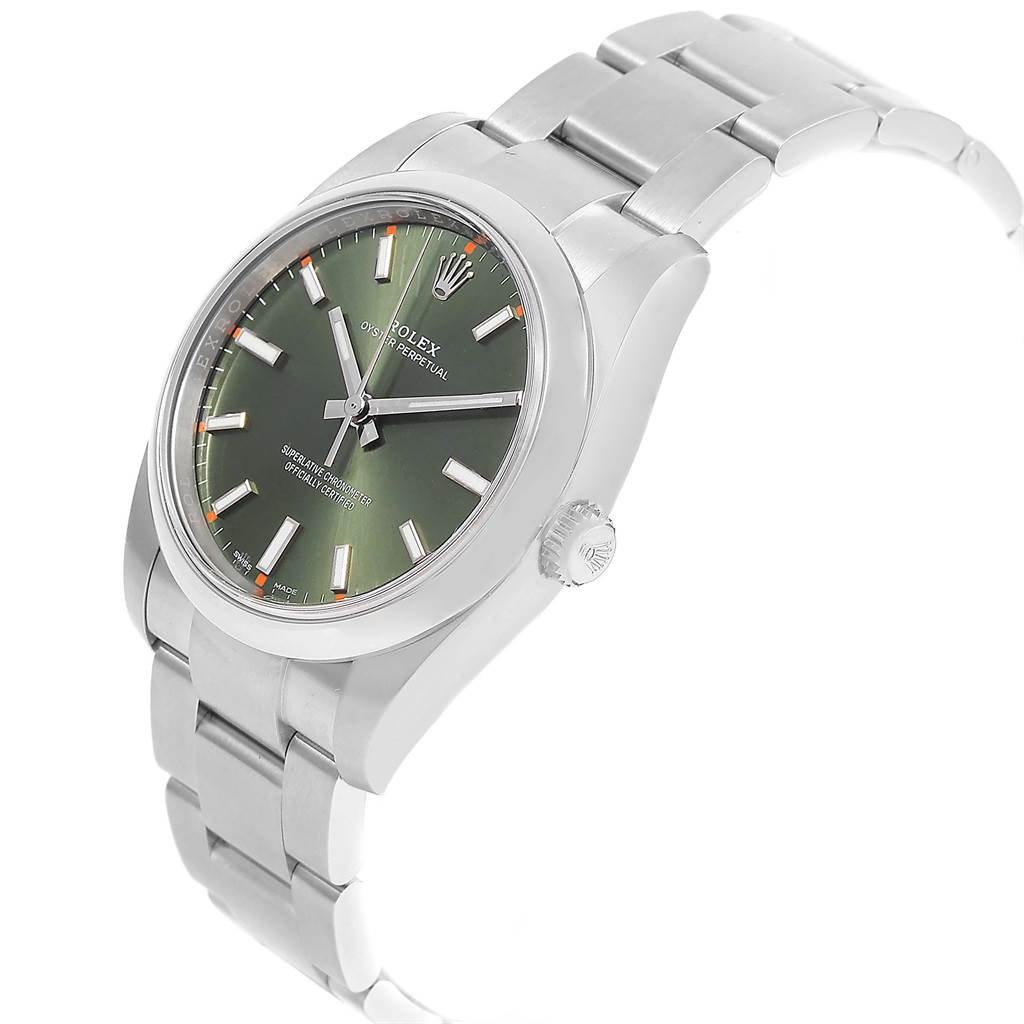 The Rolex Oyster Perpetual 114200 Stainless Steel Green Dial 114200 Stainless Steel Green Dial watch is shown at an angled view highlighting its green dial, bracelet, and crown.