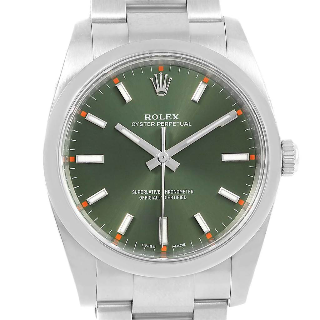 This is a front view of a Rolex Oyster Perpetual 114200 Men
s Stainless Steel Green Dial 114200 Men
s Stainless Steel Green Dial watch showing the dial, hands, crown, and part of the bracelet.