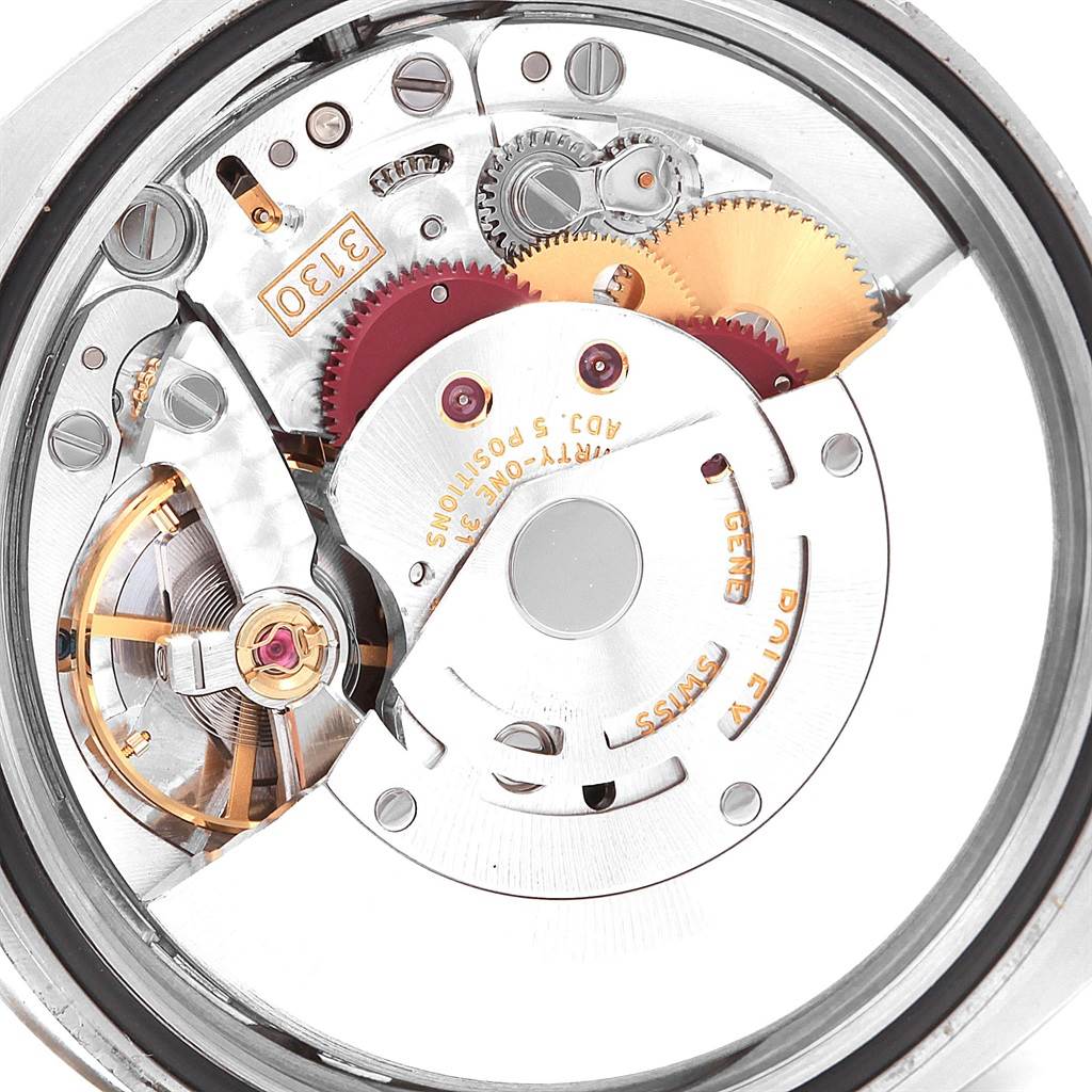 This image shows an open view of the internal movement mechanism of a Rolex Oyster Perpetual 116000 Men's Stainless Steel Black Dial 116000 Men's Stainless Steel Black Dial watch.
