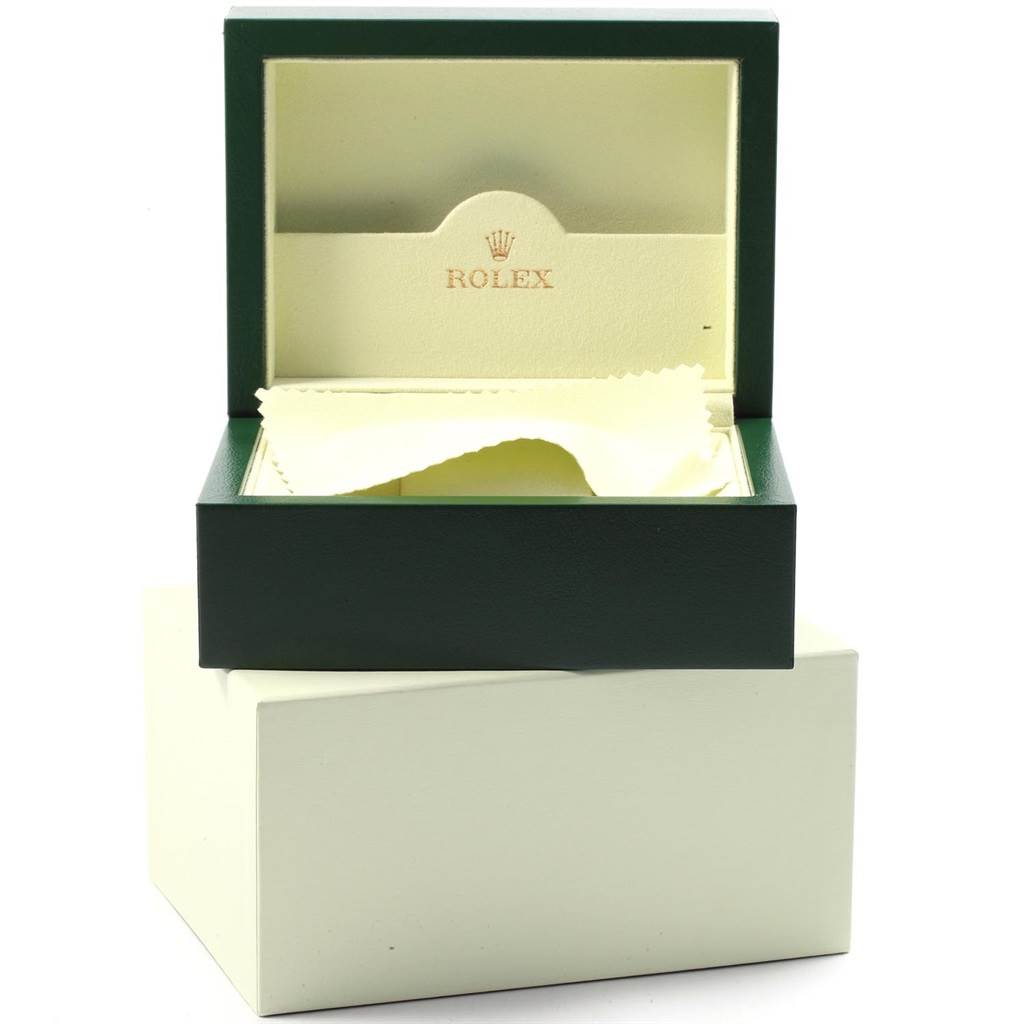 The image shows an open Rolex Oyster Perpetual 116000 Men's Stainless Steel Black Dial 116000 Men's Stainless Steel Black Dial watch box with a cleaning cloth inside.