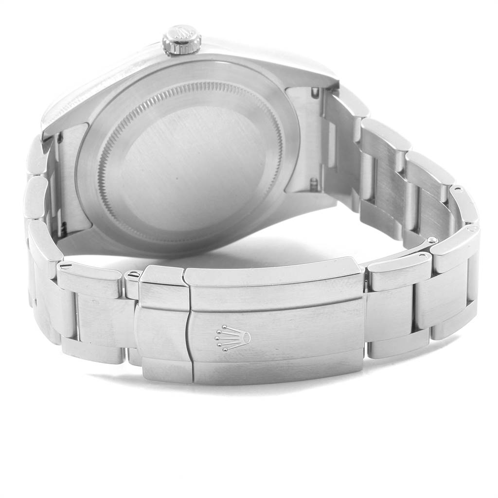 This image shows the Rolex Oyster Perpetual 114300 Men's Stainless Steel Burgundy Dial 114300 Men's Stainless Steel Burgundy Dial watch from the back, highlighting its closed clasp and bracelet.