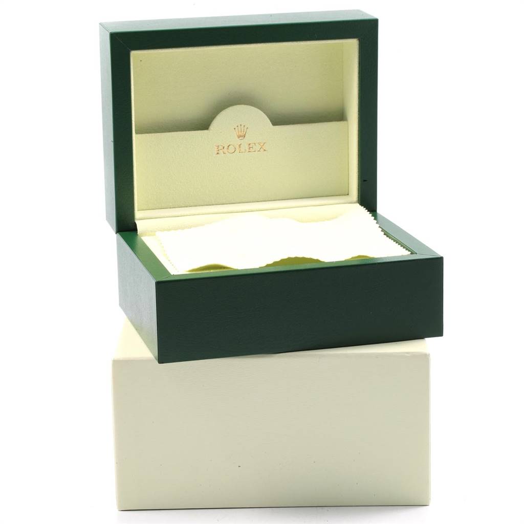 The image shows an open Rolex Oyster Perpetual 114300 Men's Stainless Steel Burgundy Dial 114300 Men's Stainless Steel Burgundy Dial watch box with a cloth inside, viewed from a front angle.