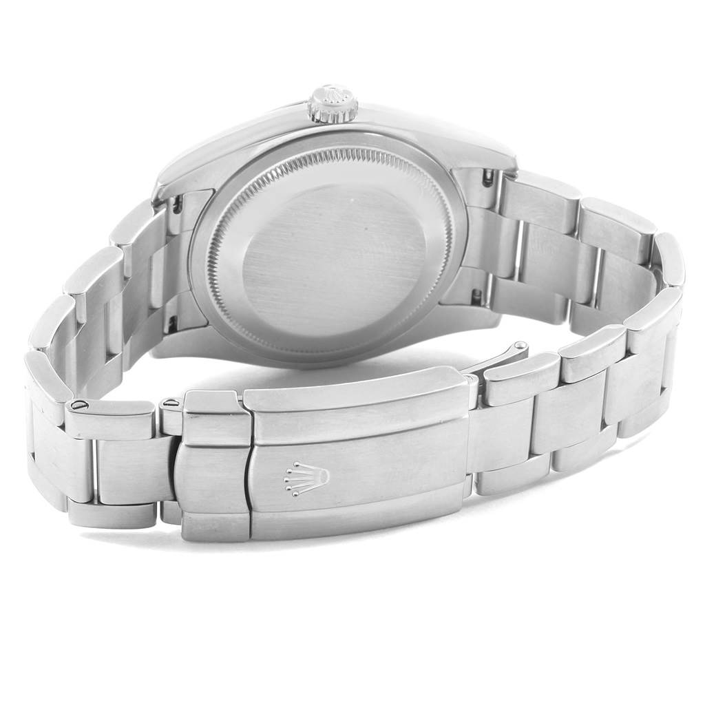 The image shows the back side of the Rolex Oyster Perpetual 116000 Men's Stainless Steel Blue Dial 116000 Men's Stainless Steel Blue Dial watch, highlighting the case back, crown, and metal bracelet with clasp.