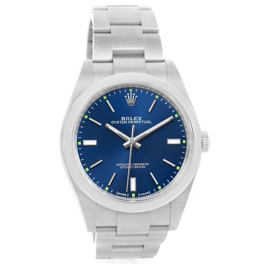 The image shows a frontal view of a Rolex Oyster Perpetual 114300 Men
s Stainless Steel Blue Dial 114300 Men
s Stainless Steel Blue Dial watch with a blue dial and stainless steel bracelet.