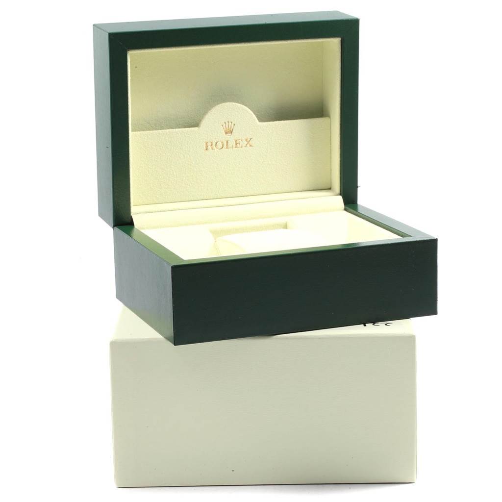 The image shows an open Rolex box for the Oyster Perpetual model, revealing its padded interior.