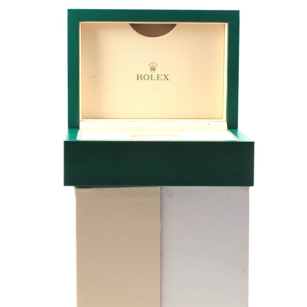 The image shows an open Rolex watch box for the Oyster Perpetual model, viewed from the front.