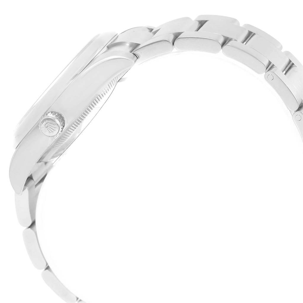 The image shows a side view of the Rolex Oyster Perpetual 114200 Men
s Stainless Steel Burgundy Dial 114200 Men
s Stainless Steel Burgundy Dial watch, highlighting the crown and bracelet.