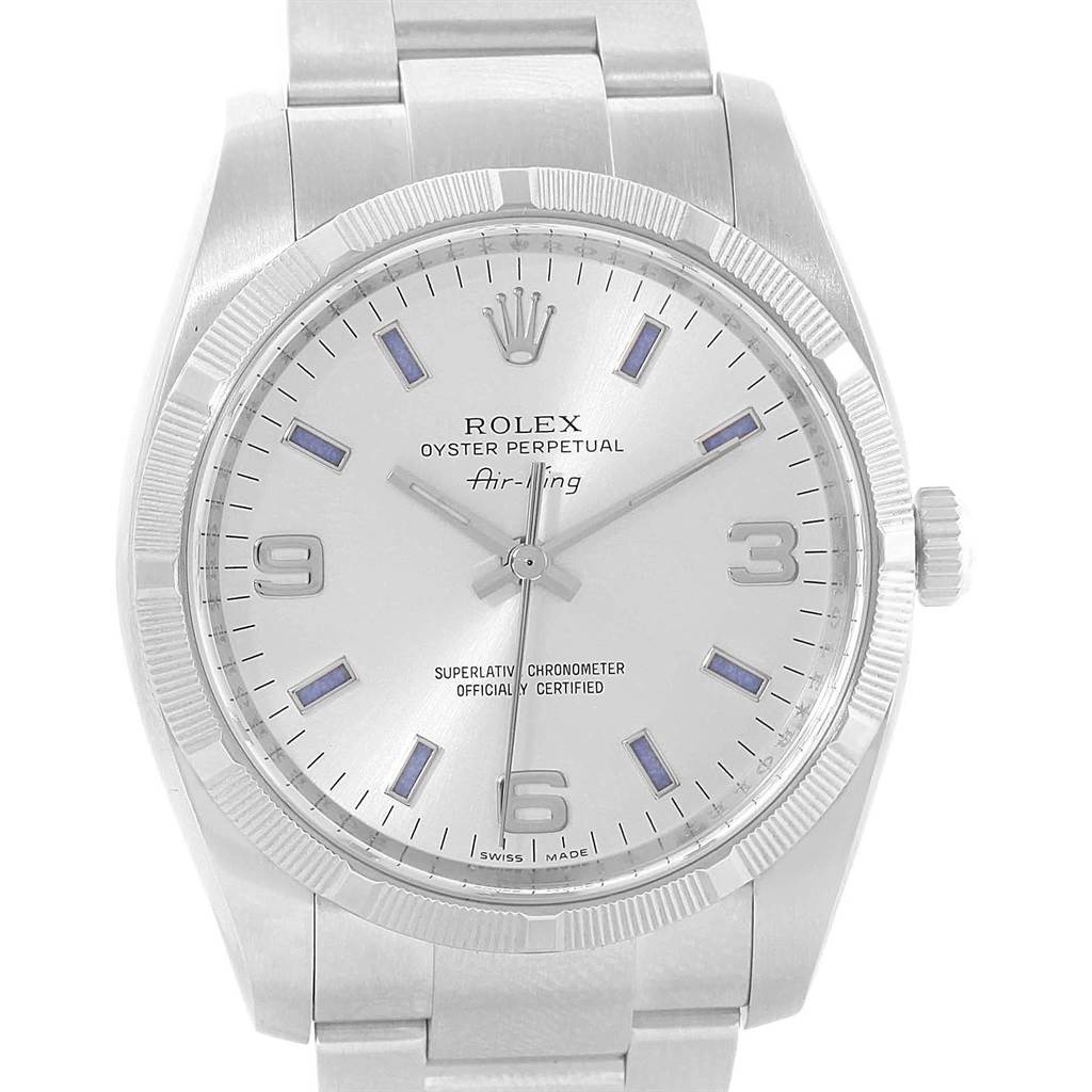 This image shows a front view of the Rolex Oyster Perpetual 114210 Men
s Stainless Steel Silver Dial 114210 Men
s Stainless Steel Silver Dial watch, showcasing its dial, bezel, and part of the bracelet.