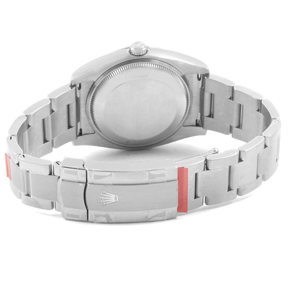 The image shows the back view of a Rolex Oyster Perpetual 114200 Men's Stainless Steel Silver Dial 114200 Men's Stainless Steel Silver Dial watch, highlighting the case back and bracelet with the clasp.