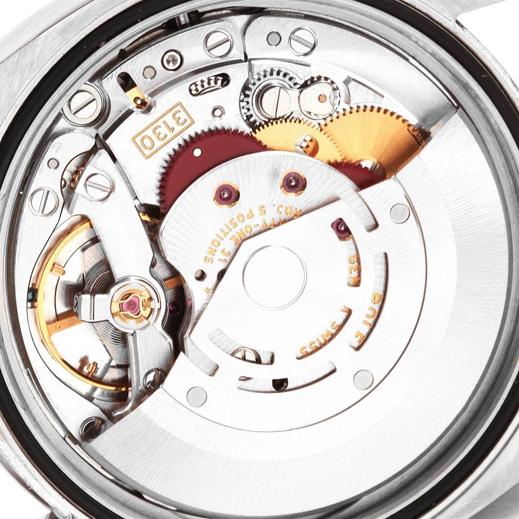 This image shows a close-up view of the movement and internal mechanics of a Rolex Oyster Perpetual 116000 Men
s Stainless Steel Silver Dial 116000 Men
s Stainless Steel Silver Dial watch.