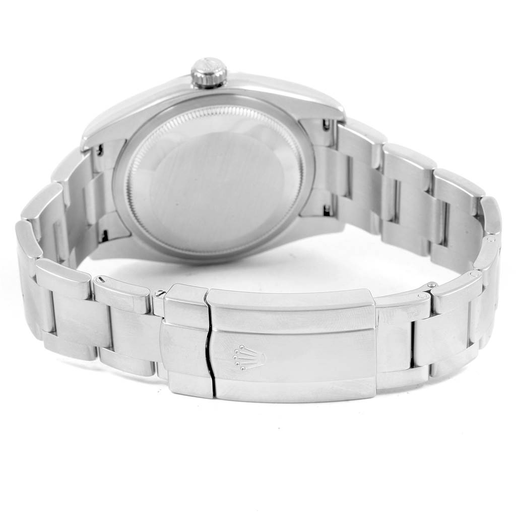 The image shows the back view, clasp, and bracelet of a Rolex Oyster Perpetual 116000 Men
s Stainless Steel Silver Dial 116000 Men
s Stainless Steel Silver Dial watch.