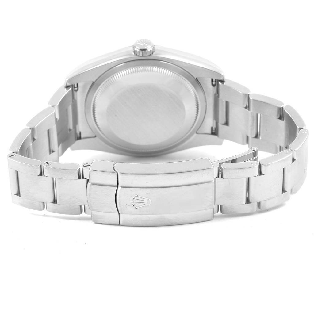 This image shows the back case and clasp of a Rolex Oyster Perpetual 116000 Men
s Stainless Steel Grey Dial 116000 Men
s Stainless Steel Grey Dial watch from a rear view angle.