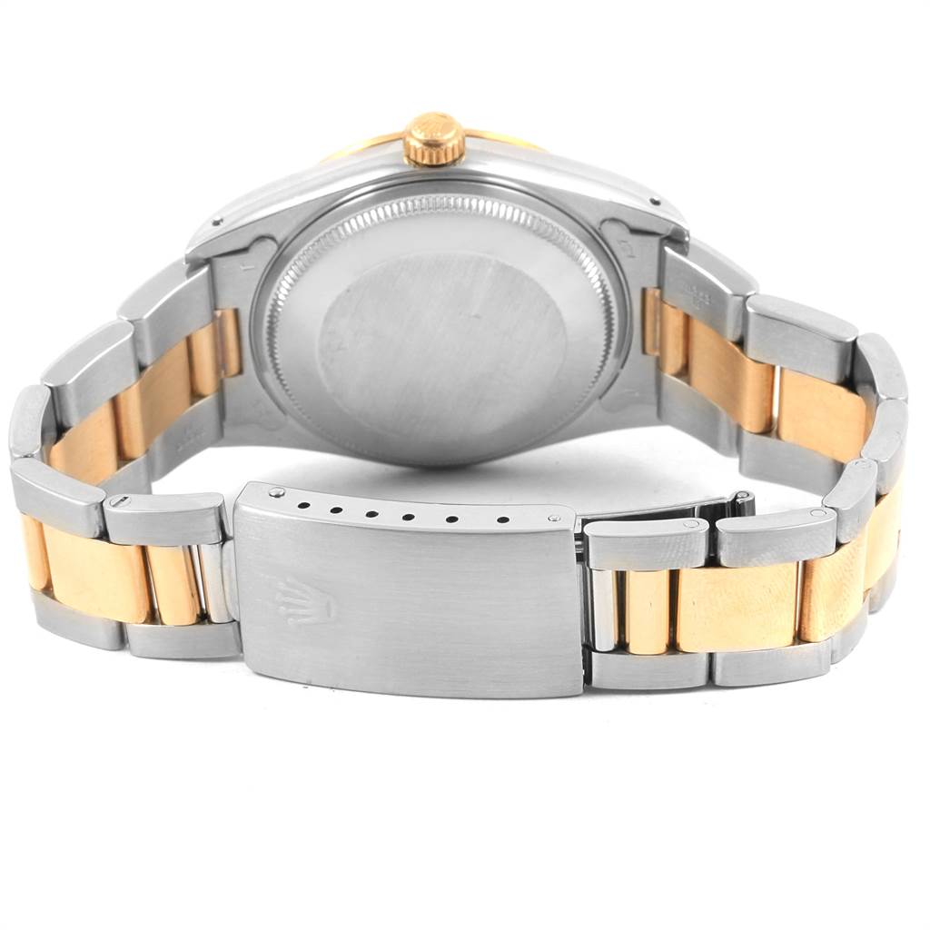 The image shows the back and bracelet of a Rolex Oyster Perpetual 14233 Men
s Steel and Gold (two tone) Silver Dial 14233 Men
s Steel and Gold (two tone) Silver Dial watch, highlighting the clasp and case back.