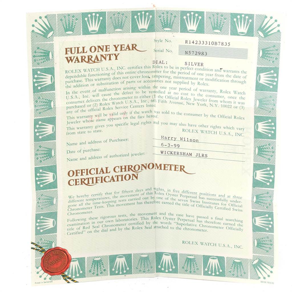 The image shows a full one-year warranty card and official chronometer certification for a Rolex Oyster Perpetual 14233 Men
s Steel and Gold (two tone) Silver Dial 14233 Men
s Steel and Gold (two tone) Silver Dial watch.