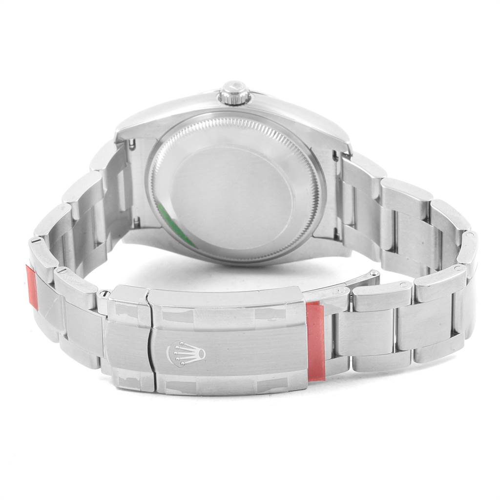 The image shows the back case and bracelet, including the clasp, of a Rolex Oyster Perpetual 114200 Men's Stainless Steel Burgundy Dial 114200 Men's Stainless Steel Burgundy Dial watch from a rear angle.