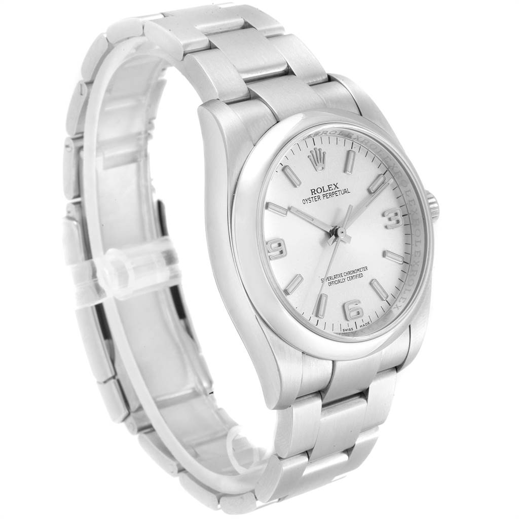 This image shows a side and slightly front angle of the Rolex Oyster Perpetual 116000 Men
s Stainless Steel Silver Dial 116000 Men
s Stainless Steel Silver Dial watch, displaying its stainless steel case and bracelet.