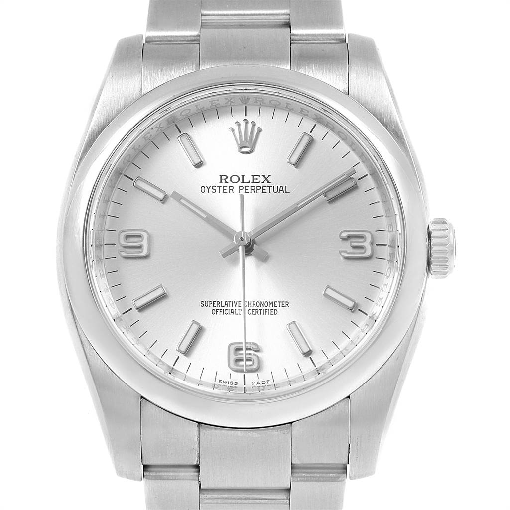 The Rolex Oyster Perpetual 116000 Men
s Stainless Steel Silver Dial 116000 Men
s Stainless Steel Silver Dial watch is shown from a frontal angle, displaying the dial, crown, and bracelet.