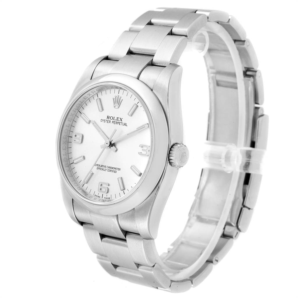 The image shows a Rolex Oyster Perpetual 116000 Men
s Stainless Steel Silver Dial 116000 Men
s Stainless Steel Silver Dial watch at an angled view, highlighting the dial, crown, and bracelet.