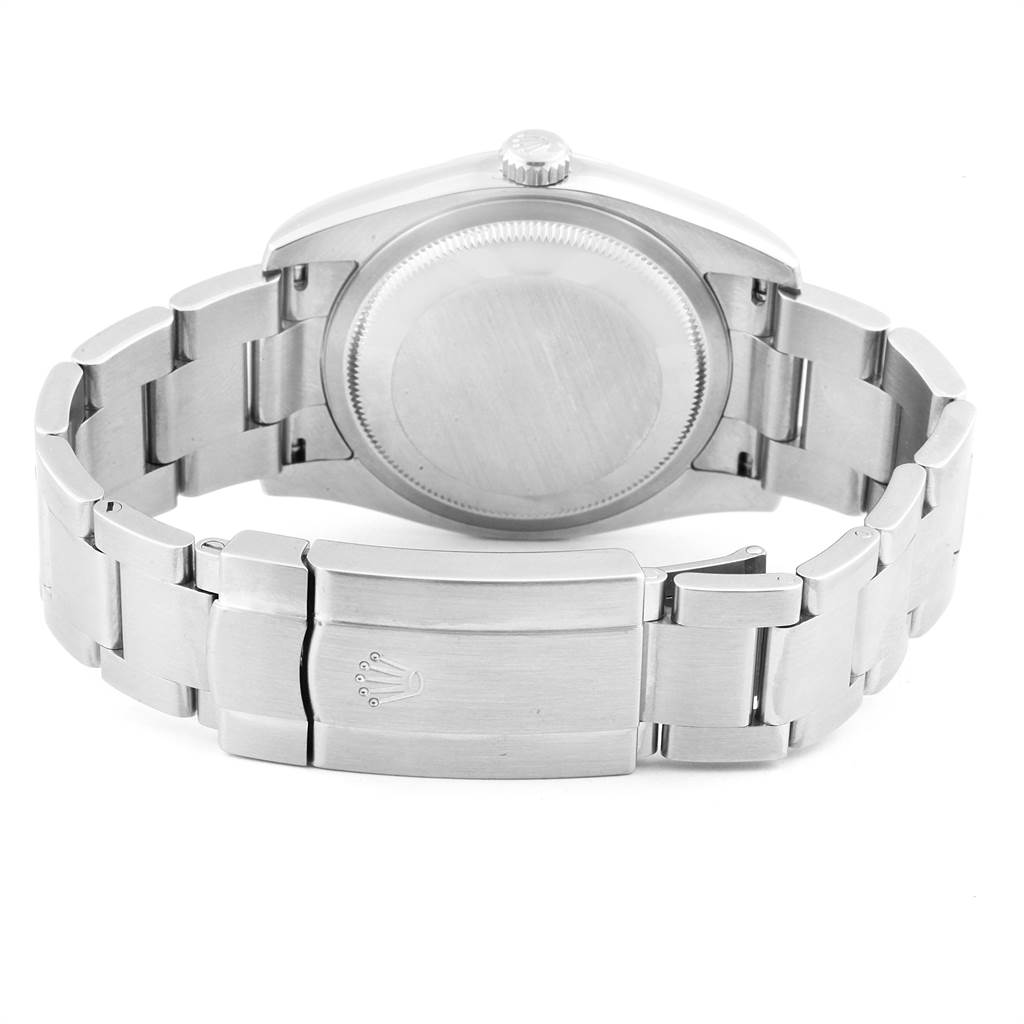 The image displays the back view of the Rolex Oyster Perpetual 116000 Men
s Stainless Steel Silver Dial 116000 Men
s Stainless Steel Silver Dial watch, focusing on the case back and the bracelet with the clasp.