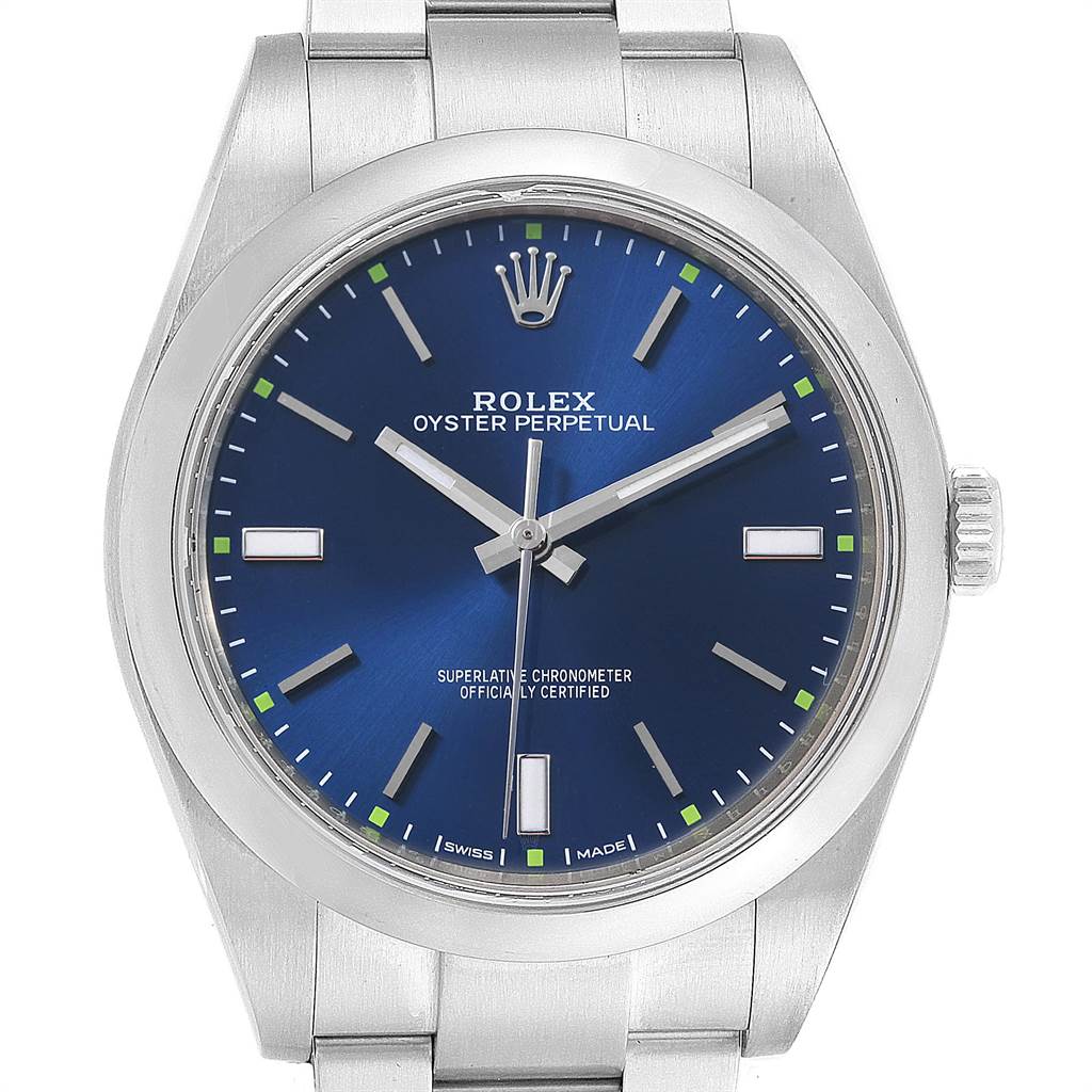 This image shows the face of a Rolex Oyster Perpetual 114300 Men
s Stainless Steel Blue Dial 114300 Men
s Stainless Steel Blue Dial watch from a front angle, highlighting the dial, hour markers, and crown.