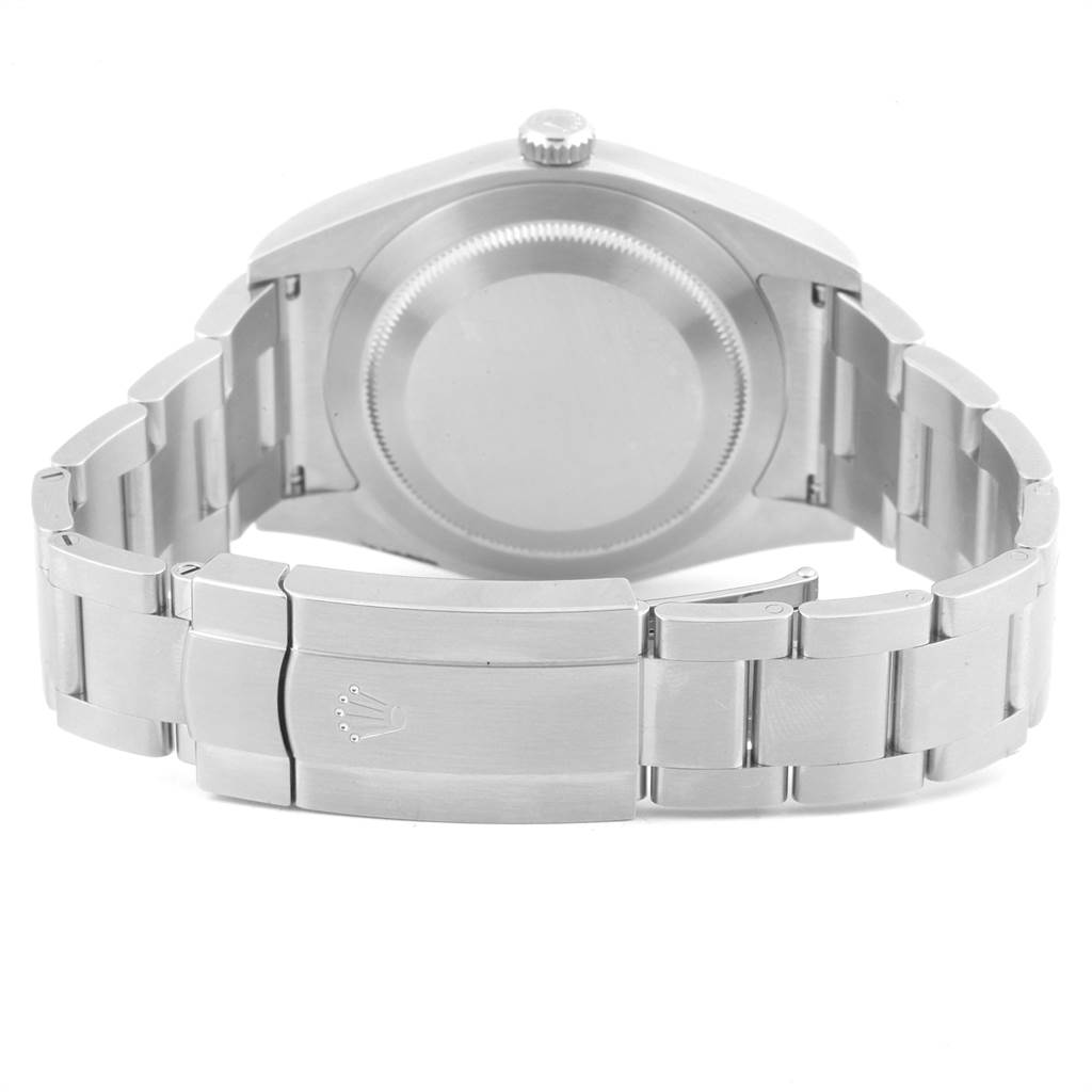 This image shows the back view of a Rolex Oyster Perpetual 114300 Men
s Stainless Steel Blue Dial 114300 Men
s Stainless Steel Blue Dial watch, highlighting the case back and the metal bracelet with its clasp.