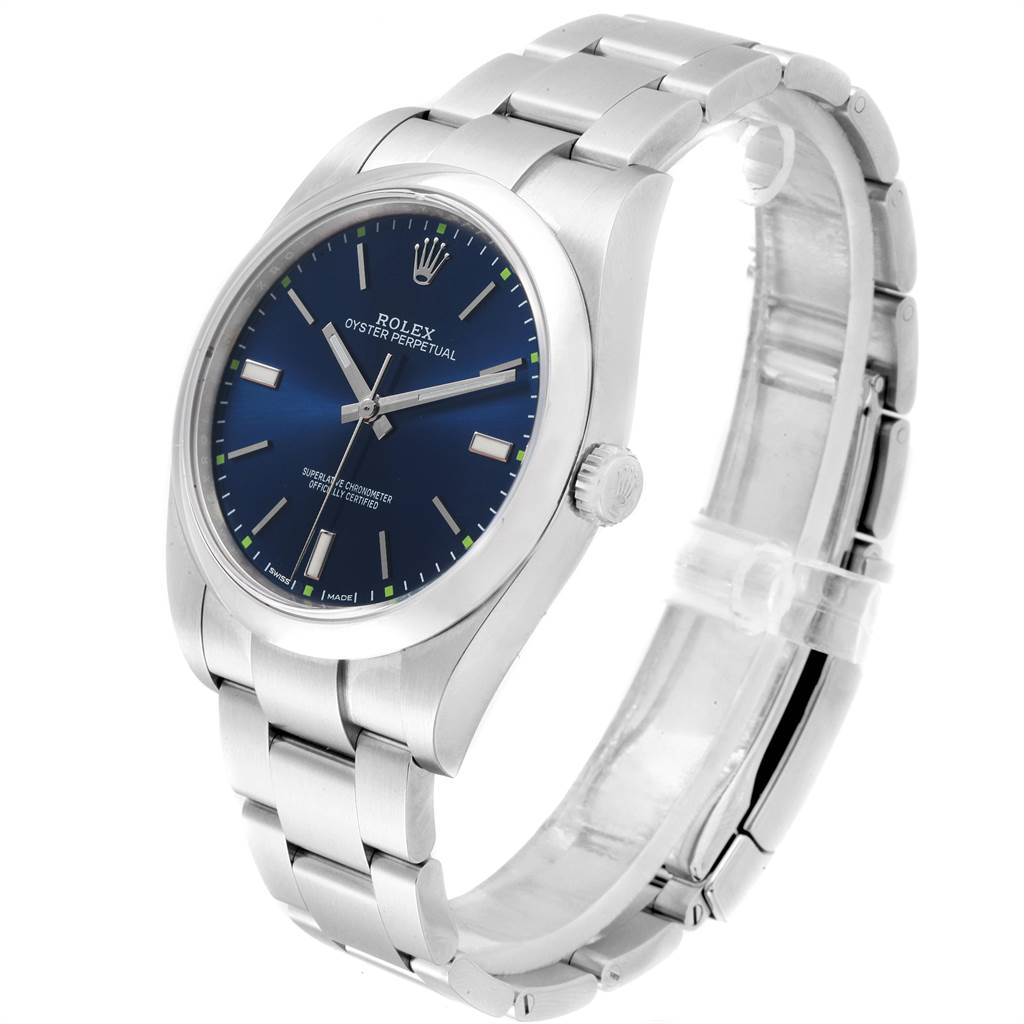 The image shows a Rolex Oyster Perpetual 114300 Men
s Stainless Steel Blue Dial 114300 Men
s Stainless Steel Blue Dial watch from a three-quarter angle, highlighting the dial, bezel, bracelet, and crown.