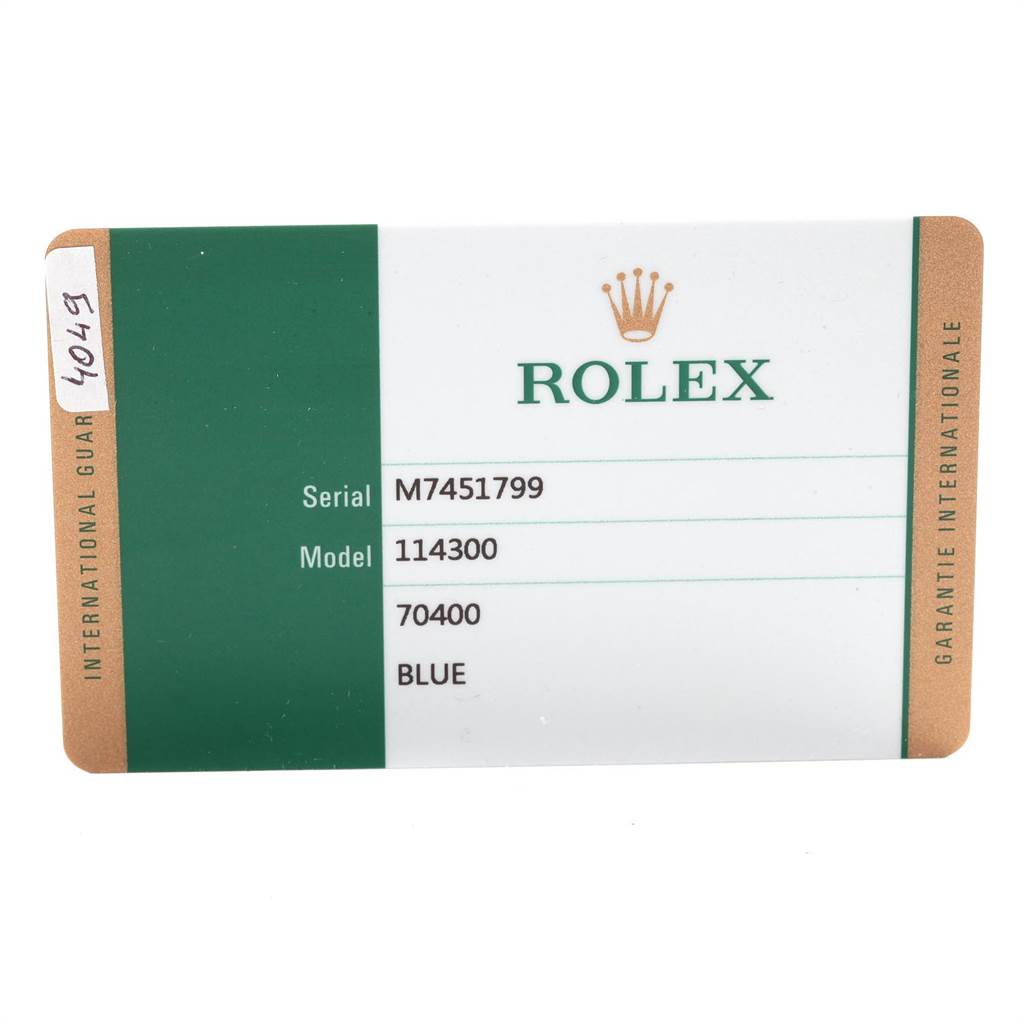 The image shows a Rolex warranty card for the Oyster Perpetual model 114300.