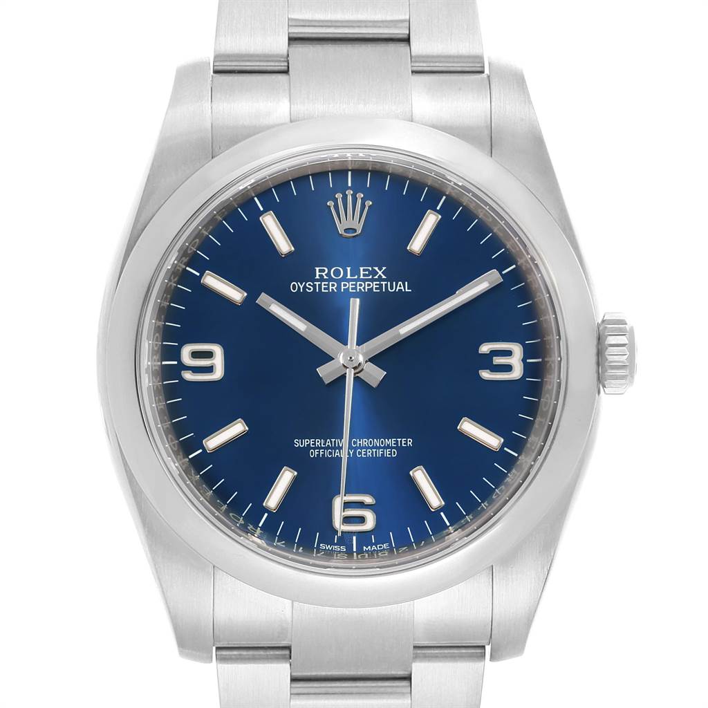 The image shows a front view of the Rolex Oyster Perpetual 116000 Men
s Stainless Steel Blue Dial 116000 Men
s Stainless Steel Blue Dial watch, highlighting its blue dial, markers, case, and bracelet.