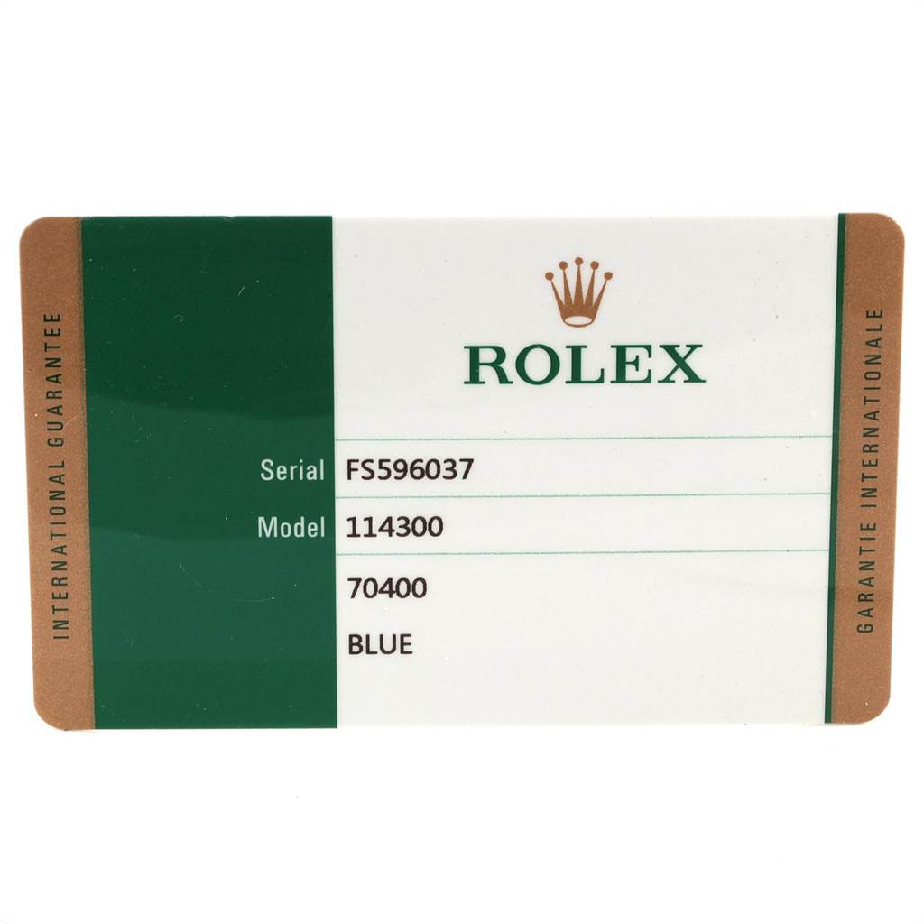 This image shows the warranty card for the Rolex Oyster Perpetual 114300 Men
s Stainless Steel Blue Dial 114300 Men
s Stainless Steel Blue Dial model 114300.