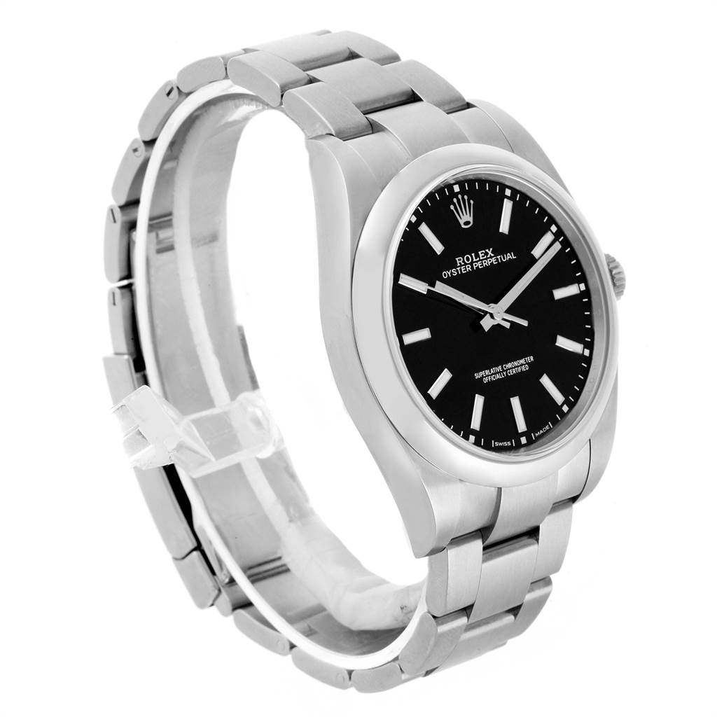 The image shows a side angle of a Rolex Oyster Perpetual 114300 Men
s Stainless Steel Black Dial 114300 Men
s Stainless Steel Black Dial watch, displaying its black dial, silver case, and metallic bracelet.