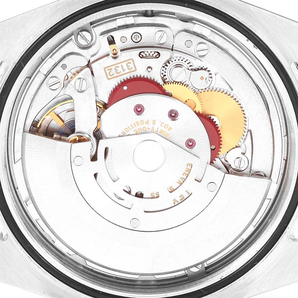 This image shows the internal movement mechanisms of a Rolex Oyster Perpetual 114300 Men
s Stainless Steel Grey Dial 114300 Men
s Stainless Steel Grey Dial watch from a close-up angle.