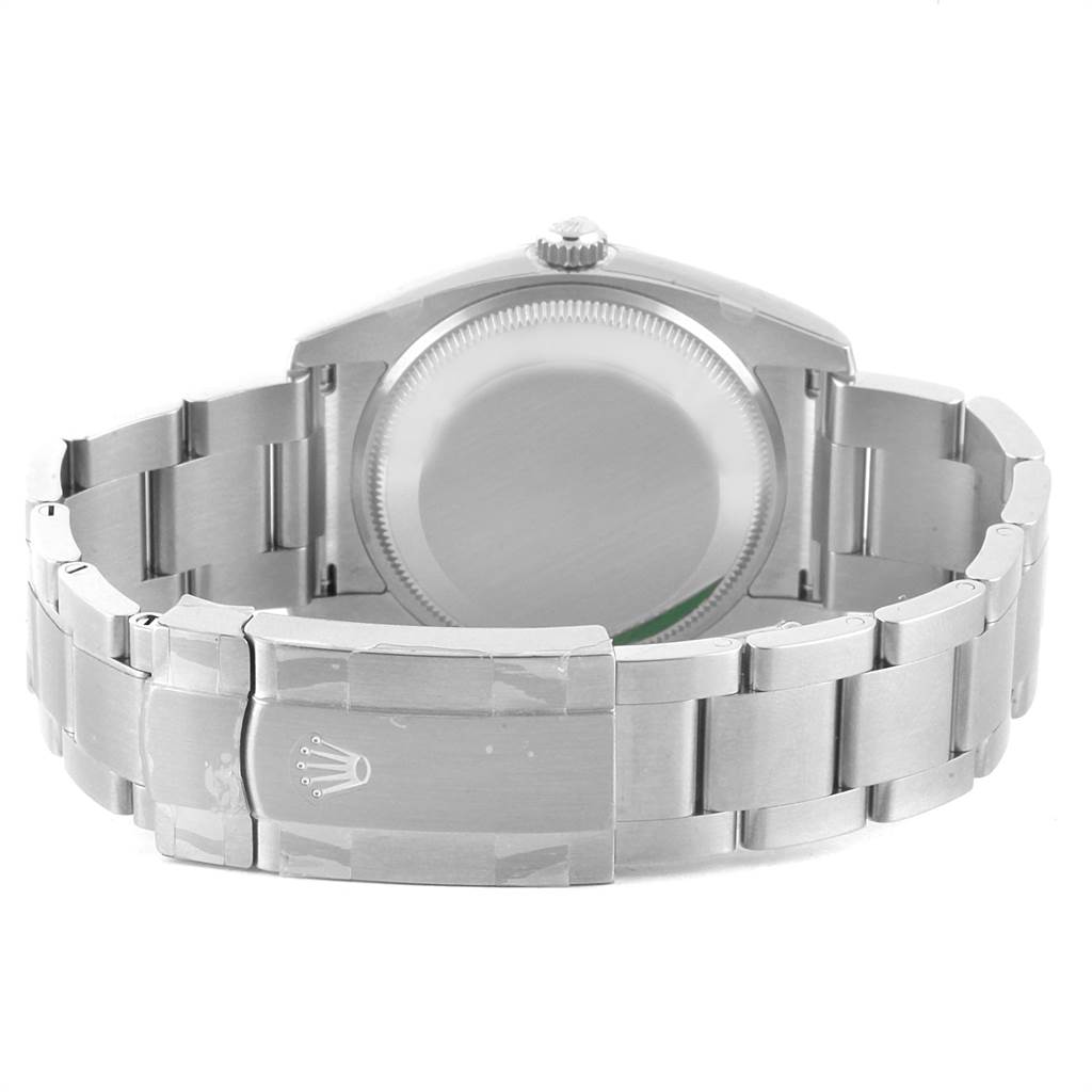 This image shows the back view of a Rolex Oyster Perpetual 114200 Men's Stainless Steel Champagne Dial 114200 Men's Stainless Steel Champagne Dial watch, displaying its bracelet and caseback.