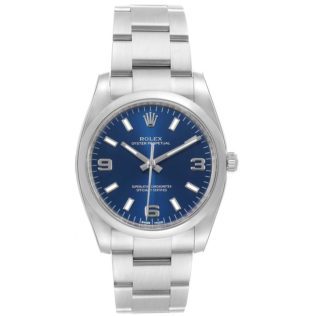 The image shows a Rolex Oyster Perpetual 114200 Men
s Stainless Steel Blue Dial 114200 Men
s Stainless Steel Blue Dial watch, viewed from the front, displaying its blue dial, hands, indices, and stainless steel bracelet.