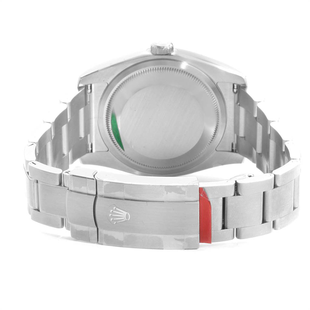 The image shows the Oyster Perpetual model by Rolex from the back, highlighting the clasp and the case back.