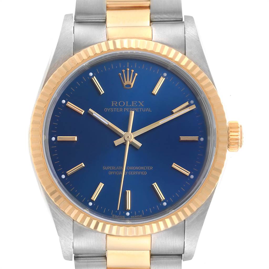This image shows a front view of a Rolex Oyster Perpetual 14233 Men
s Steel and Gold (two tone) Blue Dial 14233 Men
s Steel and Gold (two tone) Blue Dial watch featuring a blue dial, gold bezel, and two-tone bracelet.