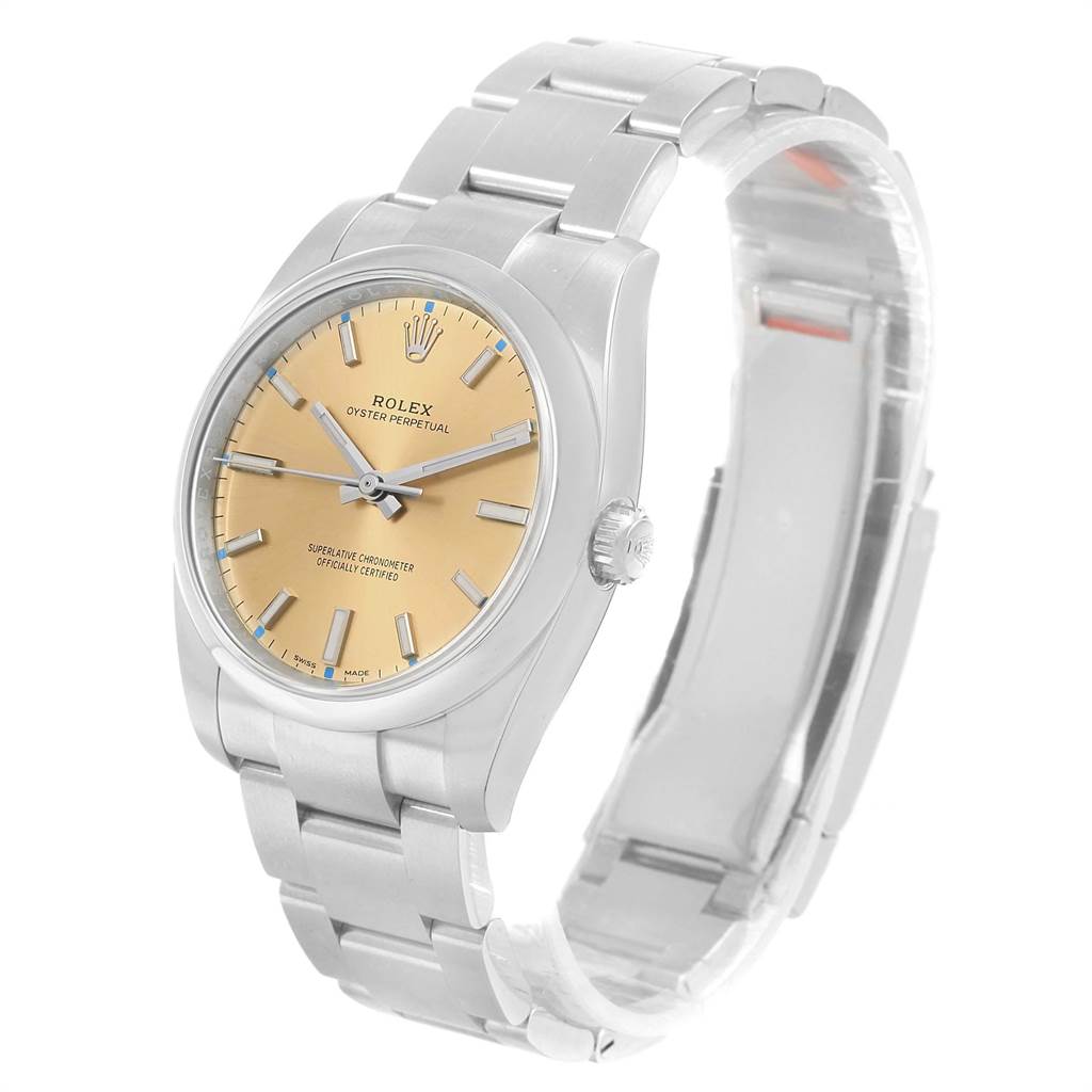 This image shows a Rolex Oyster Perpetual 114200 Men
s Stainless Steel Champagne Dial 114200 Men
s Stainless Steel Champagne Dial watch at a slight angle, displaying its dial, case, and bracelet.