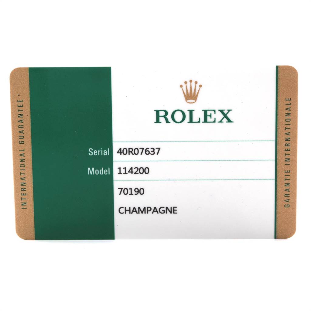 This image shows a warranty card for the Rolex Oyster Perpetual 114200 Men
s Stainless Steel Champagne Dial 114200 Men
s Stainless Steel Champagne Dial model 114200 with serial number 40R07637.