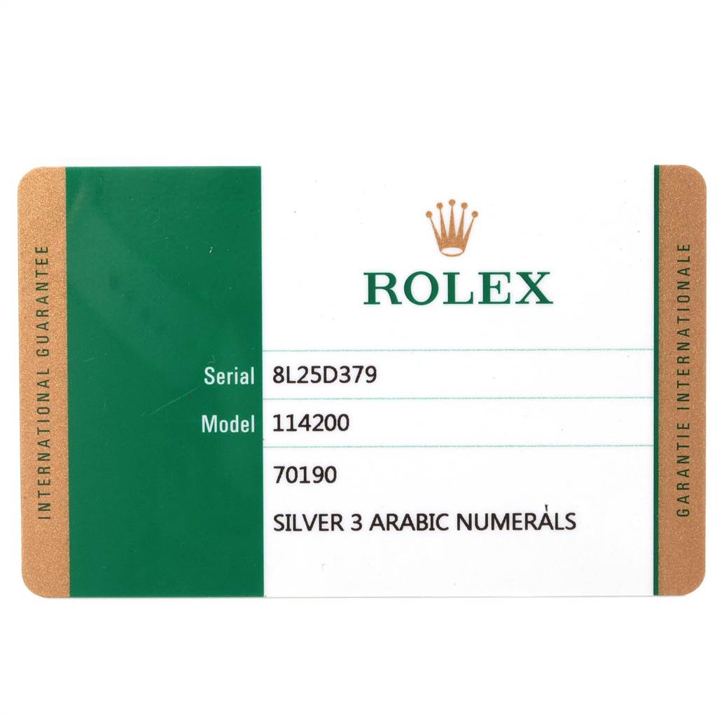 This image shows the guarantee card for a Rolex Oyster Perpetual 114200 Men
s Stainless Steel Silver Dial 114200 Men
s Stainless Steel Silver Dial watch, model 114200, with serial number 8L25D379.